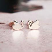 Swan stud earrings - rose gold titanium